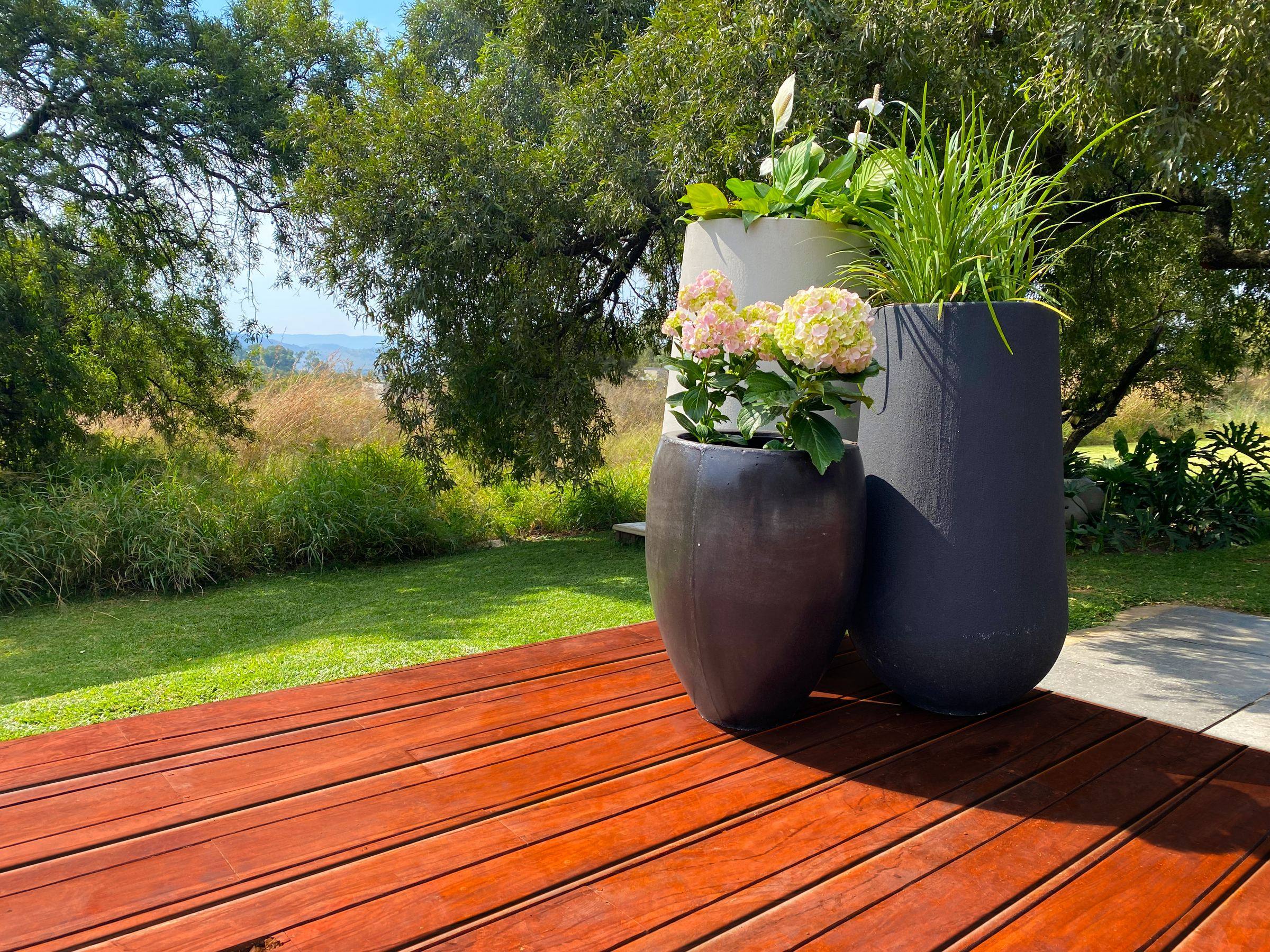 Pots styled on a garden deck